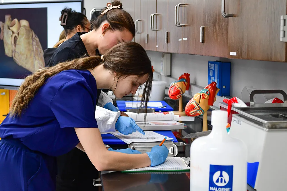 Female students in medical classroom