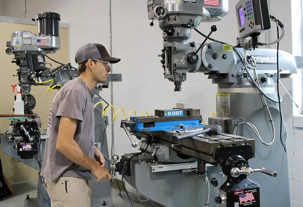 Student in machine shop