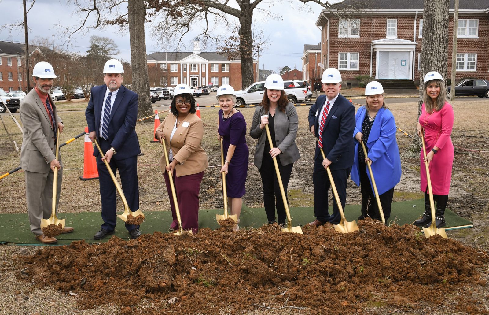 Dr. Kathy Murphy, president of Gadsden State, breaks ground with members of the executive cabinet.