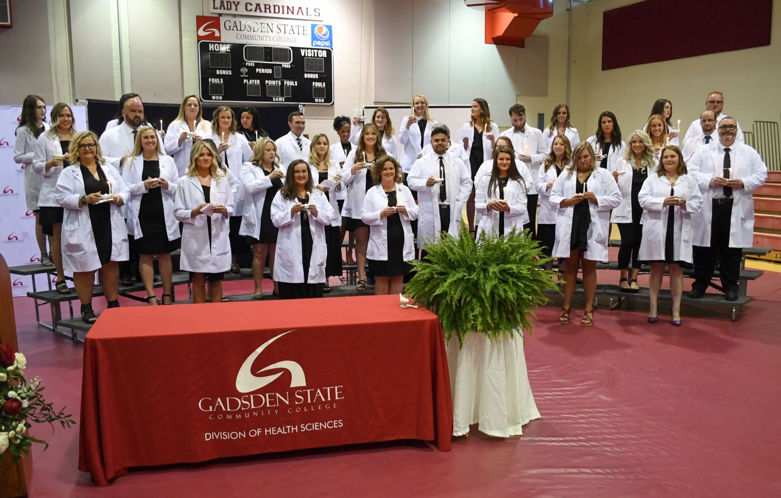 Nursing students after receiving their pins during a ceremony at Beck Field House