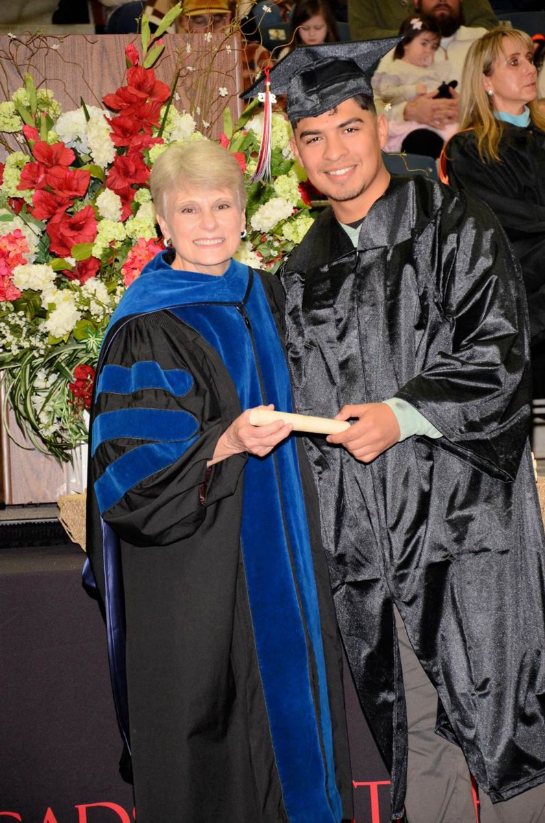 Dr. Kathy Murphy with a graduate at Gadsden State commencement